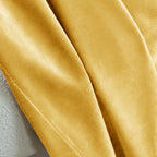 Details of the gold velvet curtain fabric
